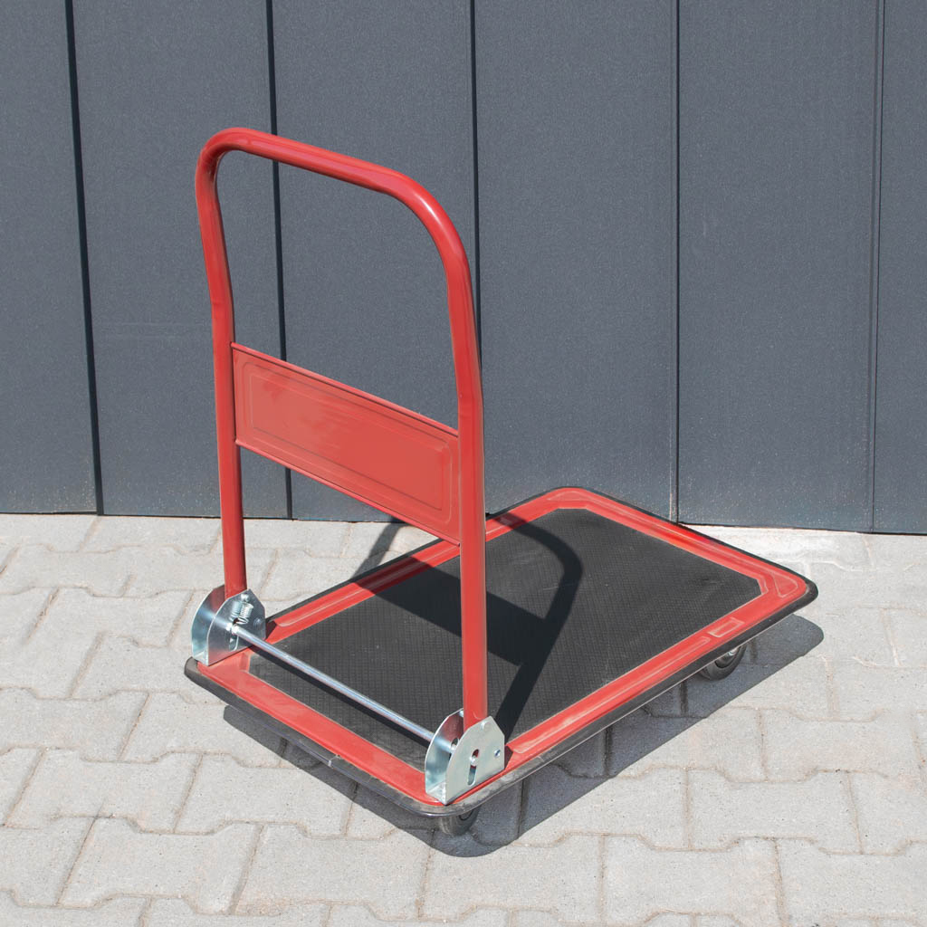 wózek platformowy, wózek transportowy, wózek magazynowy, wózek z antypoślizgową platformą, wózek ręczny do magazynu, solidny wózek transportowy, kompaktowy wózek magazynowy, wózek z kołami skrętnymi