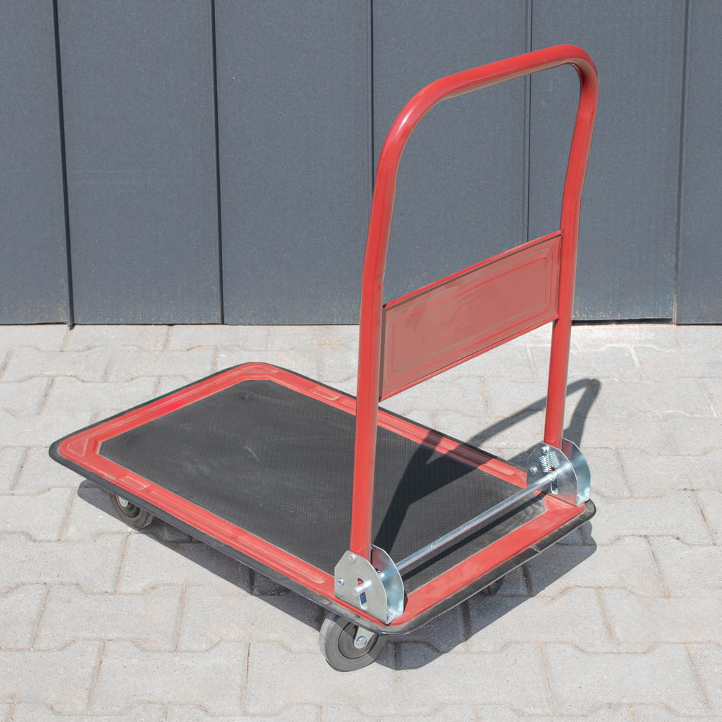 wózek platformowy, wózek transportowy, wózek magazynowy, wózek z antypoślizgową platformą, wózek ręczny do magazynu, solidny wózek transportowy, kompaktowy wózek magazynowy, wózek z kołami skrętnymi